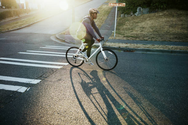 istock Cyclist Riding Bike in City Setting 1433006234