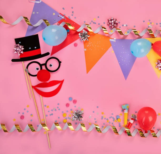 istock Funny faces on party pink background. 1433013535