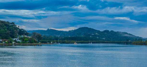 istock Respite from the rain - Bay waterscape with reflections 1433018461