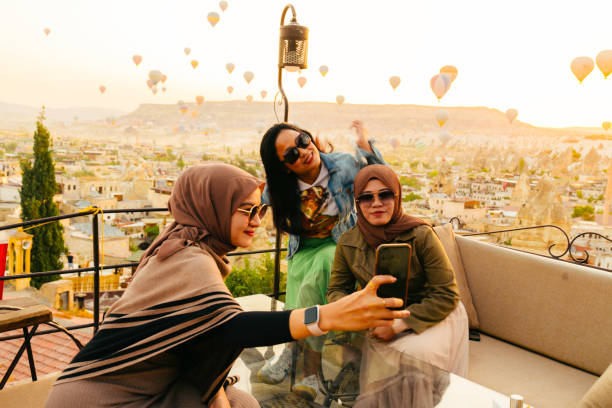 istock female friendship taking selfie photo using smartphone 1433023630