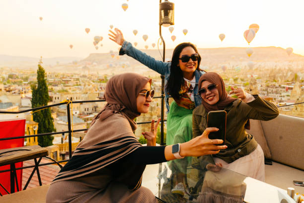 istock female friendship taking selfie photo using smartphone 1433023638