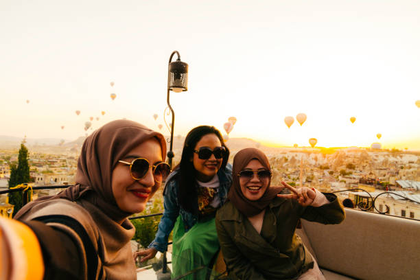 istock female friendship taking selfie photo using smartphone 1433023639