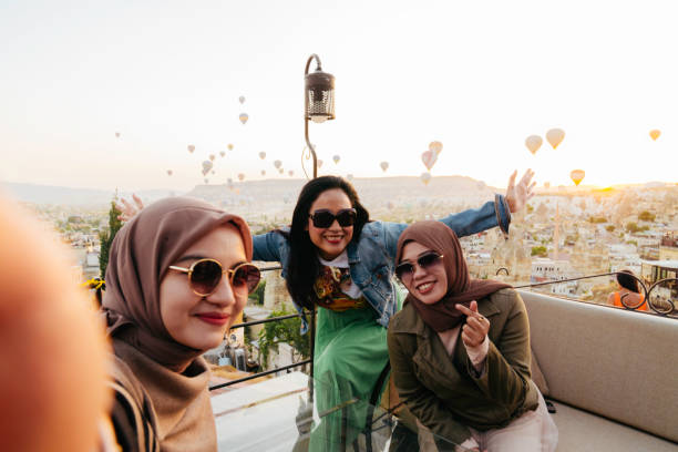 istock female friendship taking selfie photo using smartphone 1433023642