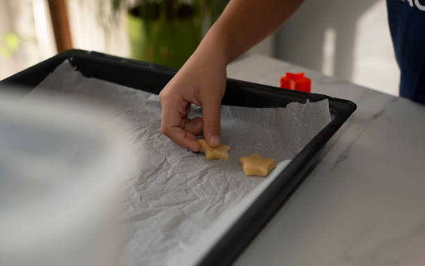 istock Child hand's playing with the flour and dought 1433027315