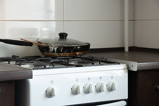 salvador, bahia, brazil - june 9, 2023: pan is seen on a kitchen stove in the city of Salvador.