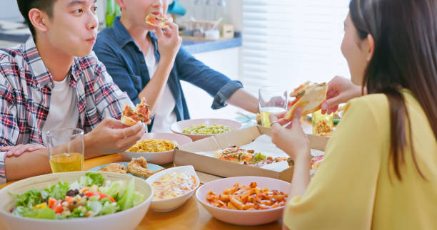 istock friends enjoying pizza 1433035260