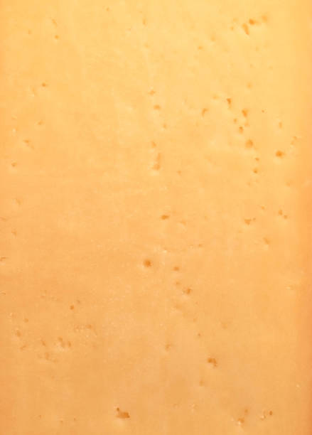 istock fresh yellow Swiss cheese with holes 1433036148