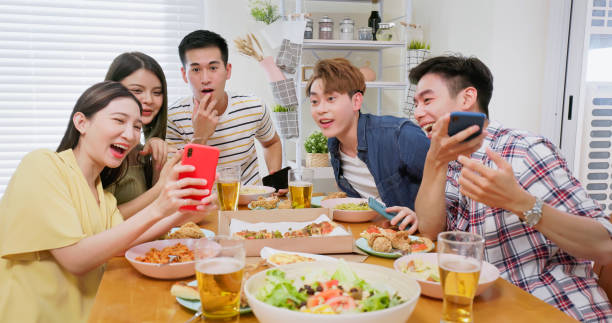 istock friends enjoying food sharing information 1433036172