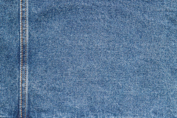 istock texture of blue jeans denim fabric with seam background 1433036222