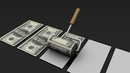 The image of a paint roller serially printing Dollars on banknote-size papers lined up in a row. Rising inflation and high cost of living have increased counterfeiting. / You can see the animation movie of this image from my iStock video portfolio. Video number: 1432013535
