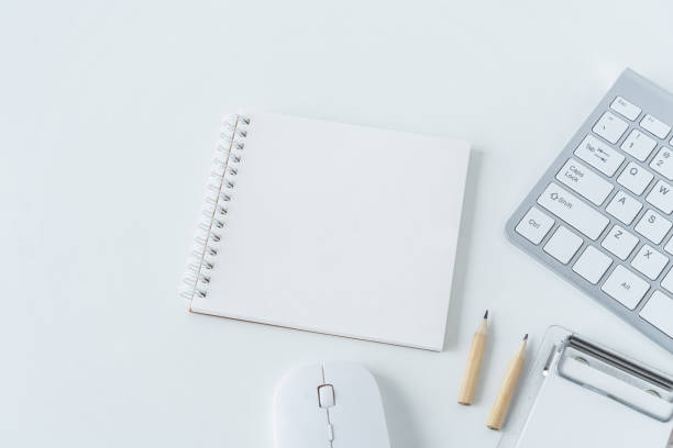 istock Top view of modern working desk with keyboard, pencil, notebook or notepad. Flat lay photography of business workplace and education learning concept. Conceptual of still life and lifestyles 1433043555