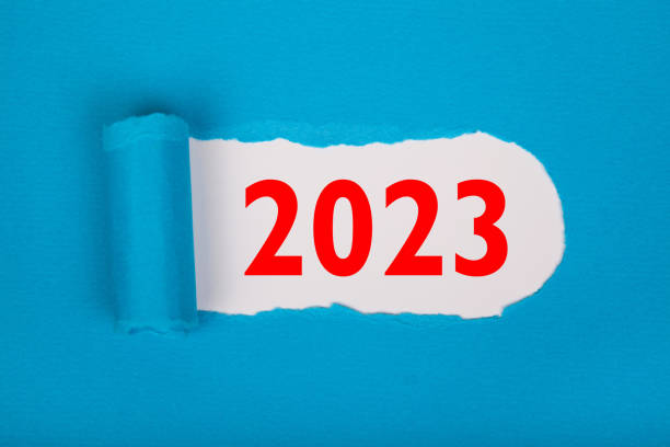 istock Torn Paper With Happy New Year 2023 On White Background 1433044864