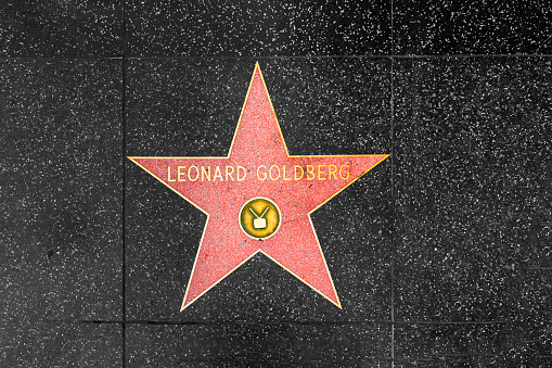 Los Angeles, USA - March 5, 2019: closeup of Star on the Hollywood Walk of Fame for Leonard Goldberg.