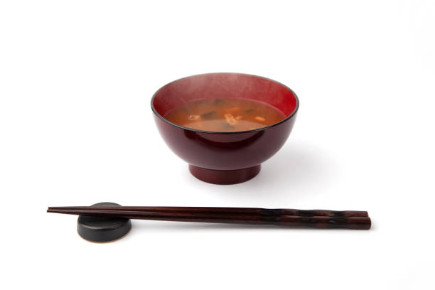 steaming hot miso soup isolated on white background