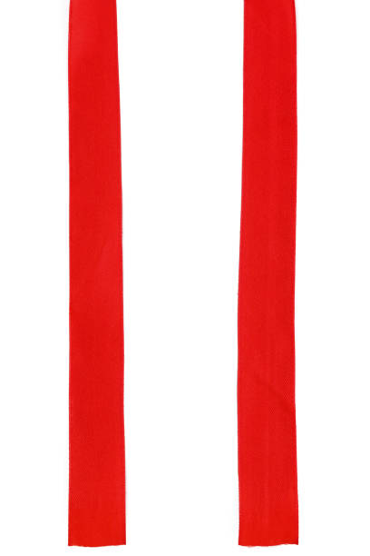 istock Top view close up of red ribbon isolated on white background. Flat lay 1433045507