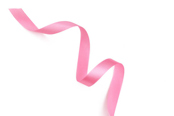 istock Curled pink ribbon isolated on white background 1433047181
