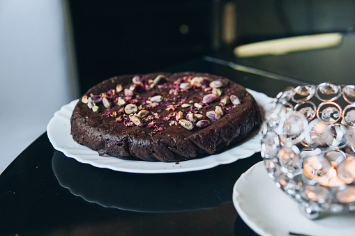 Chocolate cake with cashew nuts and pistachio