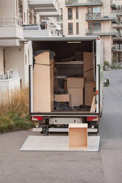 istock Transport van with tailgate open in front of modern buildings. 1433050341