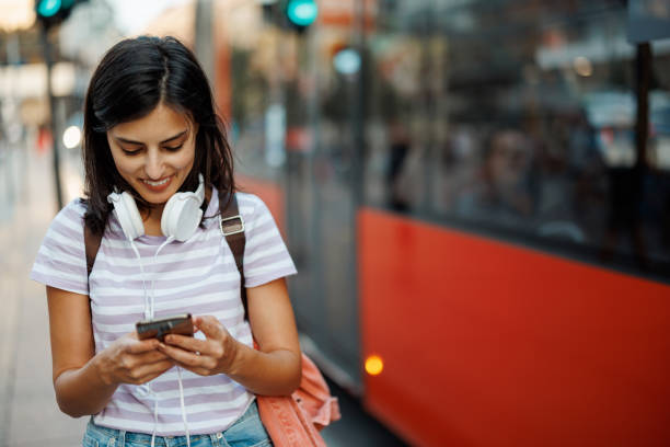 istock Woman using phone in city 1433051219