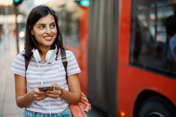 istock Woman using phone in city 1433051917