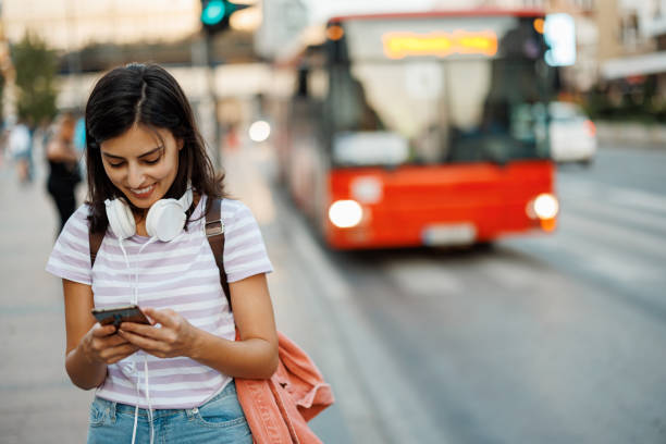 istock Woman using phone in city 1433052092