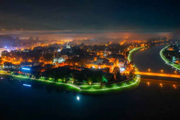 Foggy night by the Vistula river in Krakow, Poland