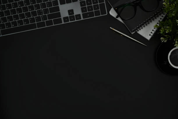 istock Flat lay keyboard, notebook, coffee cup and houseplant on black table. Top view with copy space. 1433055033