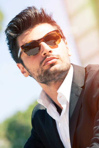 istock Handsome man with sunglasses outdoor. Shirt and jacket 1433056045