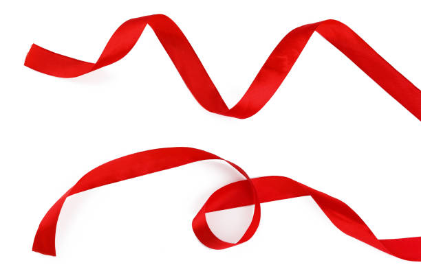 istock Shiny red satin ribbon isolated on white background 1433057081
