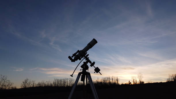 istock Silhouette of a telescope for observing space and astronomy objects. 1433059275
