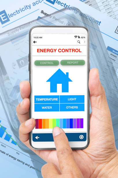 istock Hand holding smartphone show energy conservation application on display. 1433063150