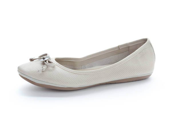 istock Female summer flat shoes isolated on white background 1433063426