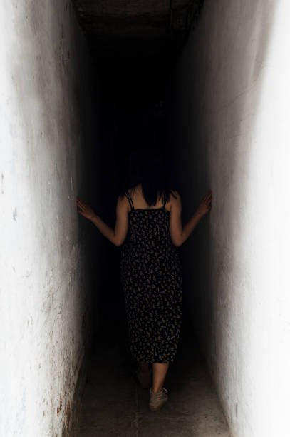 istock Woman into a tunnel 1433064221