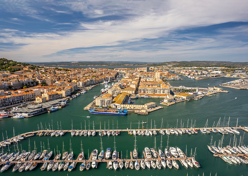 Boats arrives into Saint Tropez Harbor, one of the most famous places in the world located on French Riviera, Cote d'Azur, Mediterranean Sea, Saint Tropez was made famous by Brigitte Bardot in the 1960s, it is a playground for actors, models, millionaires and jetsetters.