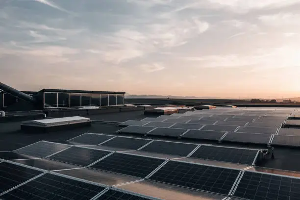 Photo of a photovoltaic system on a roof, for sustainable energy and against climate change