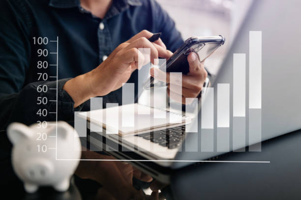 istock Businesswomen analyzing investment graph and discussing plan in office 1433068620