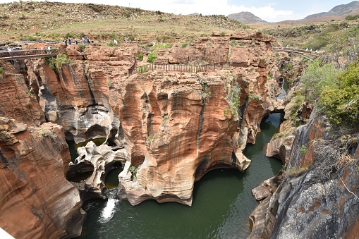 A wide angle shot of geological attraction of Bourke's Luck Potholes in Moremela, South Africa during daytime