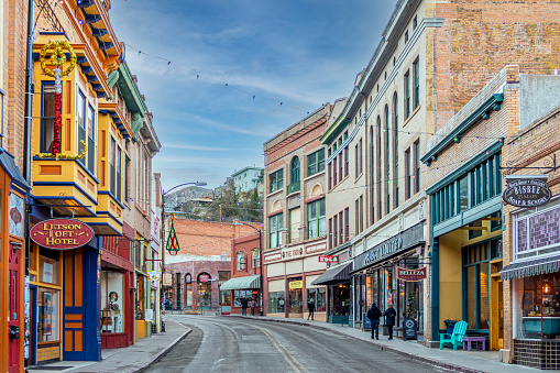 Bisbee, USA - December 29, 2019: Buildings lining Main Street on a clear day at the edge of Bisbee, Arizona