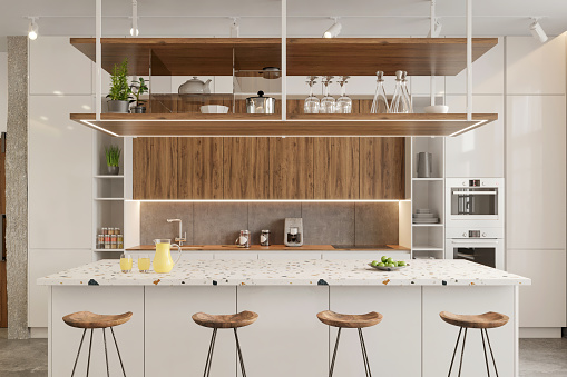 Bright kitchen interior with terrazzo island, sink, cabinets, wooden details,  kitchen appliances and concrete floor in a modern coworking space. Render