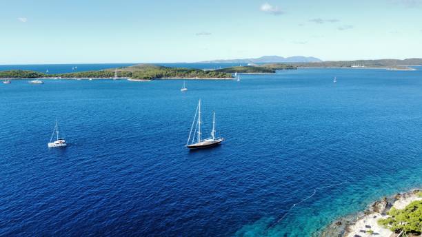 istock Beatuful blue seascape and a big and small ships floating on it tranquil waves 1433073251