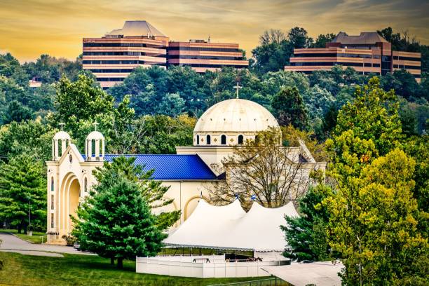 istock View of a white church in botanical trees at sunset 1433074547