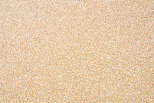 Textura de arena lisa limpia, textura arenosa húmeda, fondo tropical photo