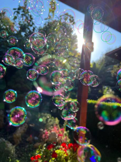 istock Vertical shot of soap bubbles floating in the air 1433075007
