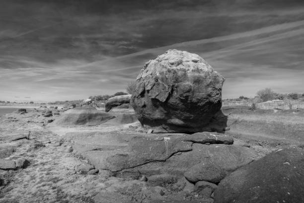 istock Giant rock in a rock desert in grayscale 1433076390