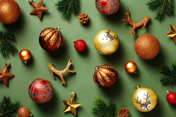 istock Vintage Christmas ornaments on dark green table. Flat lay, top view. 1433076977