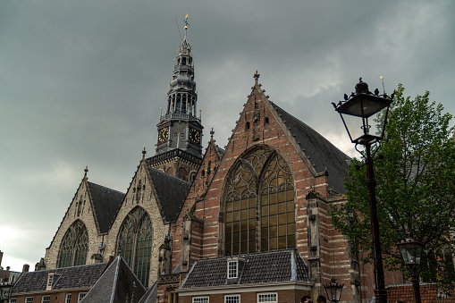 An aerial view of Oude Kerk cathedral building facade in Amsterdam