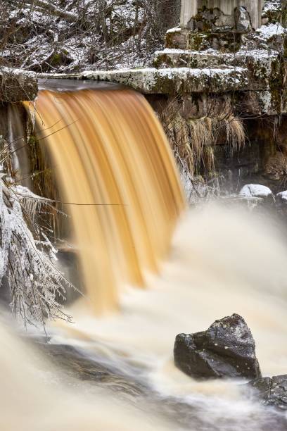 istock Low exposure of water flowing down the rocks. 1433080664