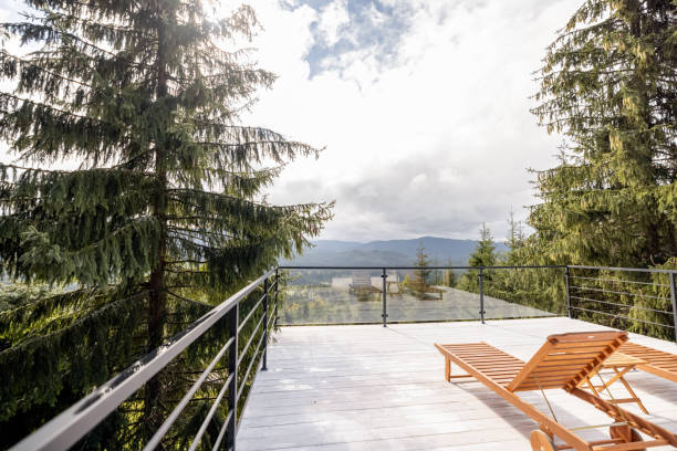 istock Spacious terrace with wooden lounge beds on nature 1433080691