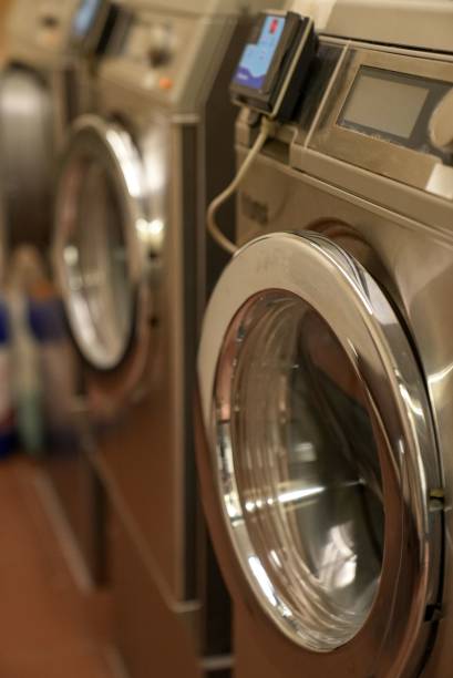 istock Selective focus shot of wash machines line in a laundry 1433081052
