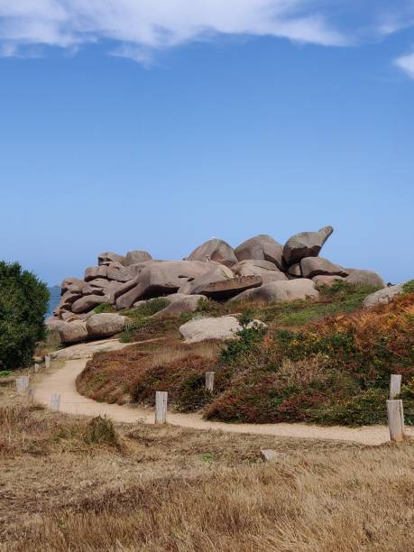 istock Scenic view of rock formations at the seashore 1433082126
